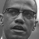 Malcolm X is shown addressing rally in Harlem, New York on June 29, 1963.